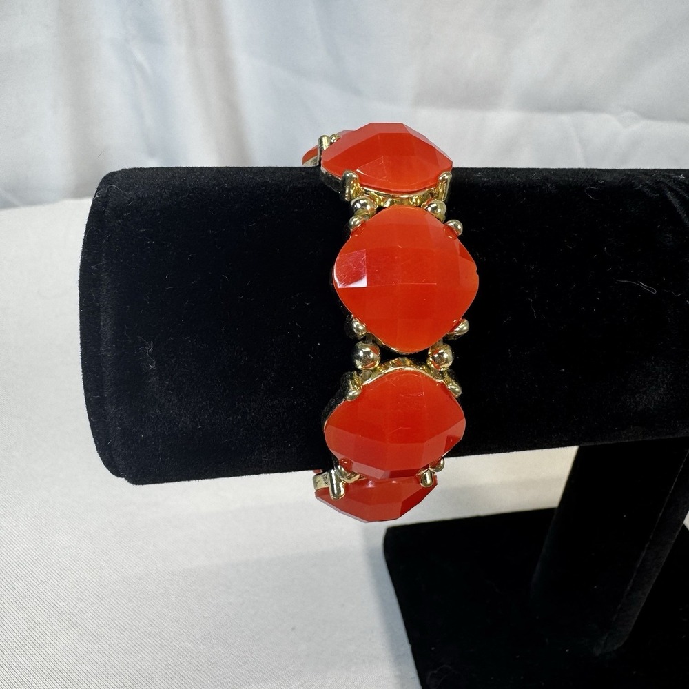 Gold-Tone Bracelet with Red Faceted Stones